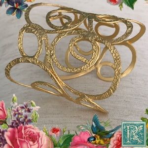 Adjustable “Wide” Gold Tone Swirl cuff bracelet
